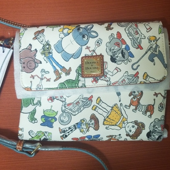 Dooney & Bourke Handbags - HP🎉Dooney & Bourke Toy Story Crossbody